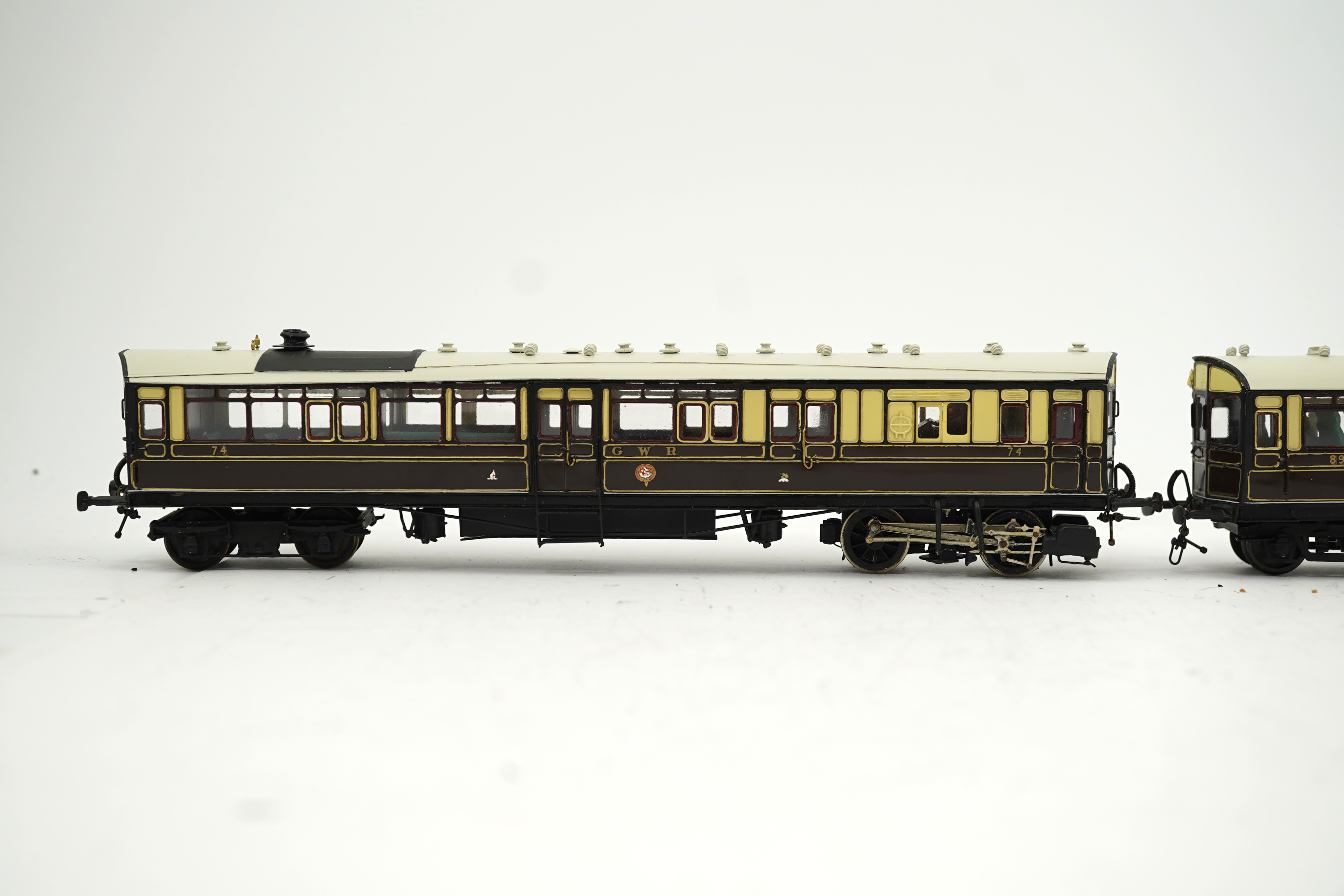 Two 00 gauge plasticard and brass, etc. kit built GWR rail motors; No.74 and No.89, constructed, painted and lined to a high standard, together with a BR turbine electric Co-Co locomotive, 18100, constructed using plasti